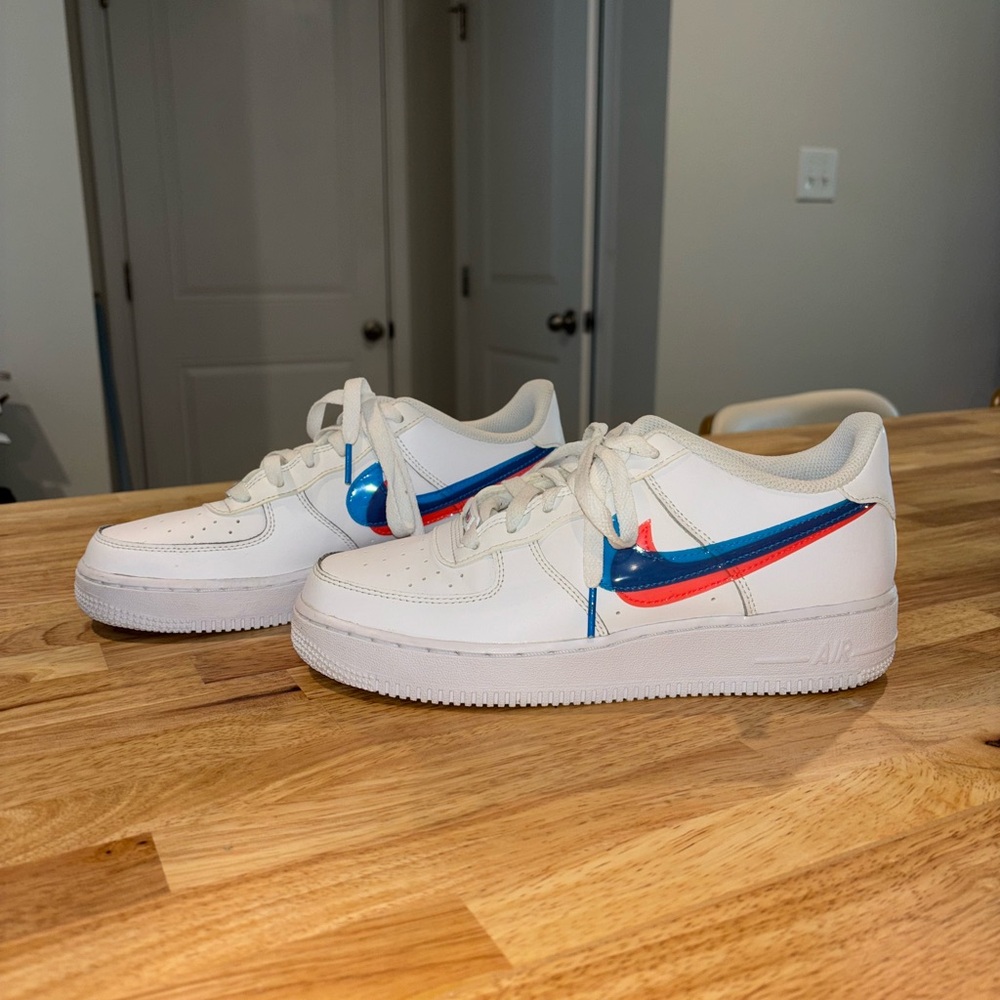 Nike White Sneakers with Blue and Red Accents